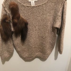 Hand knitted sweater with fur embellishments